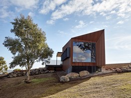 The sculpted corten form that frames the landscape perfectly