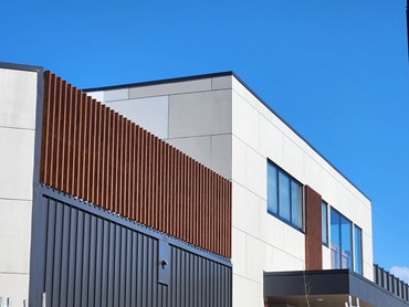 Alteria wood look aluminium battens were selected as a feature over the fibre cement cladding