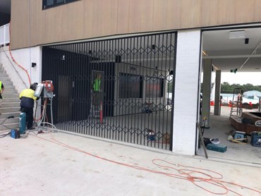 ATDC's expandable t-max aluminium security door at the URBNSURF surf park facility