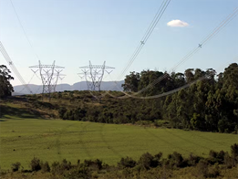 New transmission lines are controversial for nearby communities. But batteries and virtual lines could cut how many we need