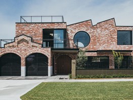 A contemporary home that looks like a heritage factory