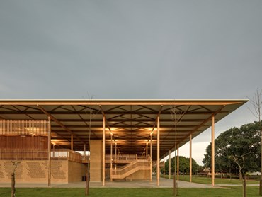The Children Village comprises two identical structures&mdash;one for male students and one for female students&mdash;defined by a huge timber roof. This roof canopy is supported by glue laminated timber beams and columns, which is an uncommon material for the region. Images: Supplied
