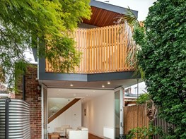Renovated terrace house with garden views and passive solar design