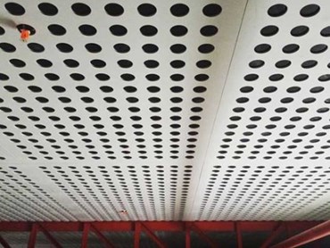 The ceiling features perforated fibre cement FC Key-Endura panels (Image: Timothy Garry)