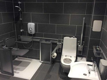 An accessible bathroom with Pressalit wall track system