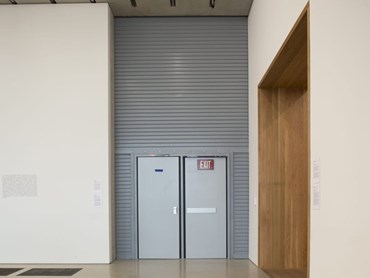 Fire shutters with integrate egress doors