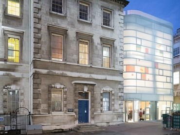The building features a softened, translucent exterior in the day, which lights up like a lantern at night. Photography: Iwan Baan for Steven Holl Architects
