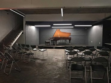 A QUATTRO stage installation for Tempo Rubato featuring a grand piano 