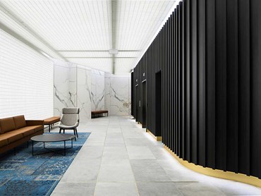Mokuzai cladding panels lining the curved interior wall at The Melbourne Grand