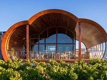 The wine barrel-shaped Cellar Door featuring UniCote LUX Ashwood steel cladding 