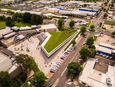 The Orange Regional Museum by Crone Architects boasts an&nbsp;expansive grass roof&nbsp;&ndash; a continuation of the ground-level lawn. Photography by Troy Pearson&nbsp;
