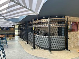 Crowd control barriers secure bar counter at Waterloo Station Hotel 