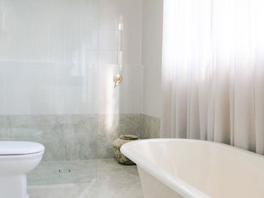The frameless shower screen allows for an open flow through the space