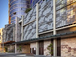 Cobble effect custom facade provides solar shading for Ritz Carlton