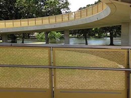 Perforated panels on new Hassell-designed bridge over Anzac Parade anodised by Universal 