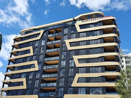 Black and gold Aodeli SAP cladding stuns on iconic Monterey Apartments 