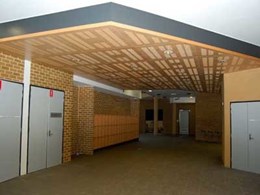 Ultraflex’s slotted FR MDF with Euro Beech veneer customised for lecture theatre, library and foyers at Newington College NSW