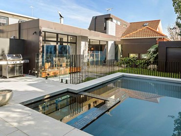 The Elwood home featuring Anston's dropdown pool coping 