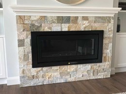 Farmhouse style fireplace showcases inspired use of stacked stone