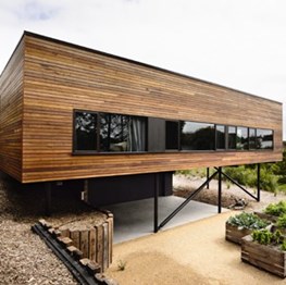 Blairgowrie House by Wolveridge Architects perches on sand dune with help of robust materials