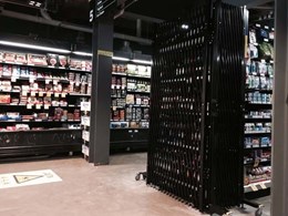 ATDC’s portable expanding barricades securing liquor aisles at Woolworths Metro store