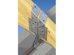 MiTek BlockFast strap holds down roof truss to concrete masonry walls