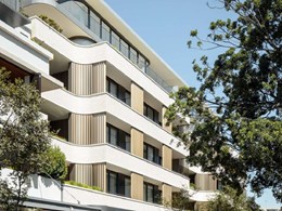 Curvy facade design in brick inlay impresses at Double Bay apartments
