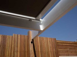Aalta patio awning helps homeowner keep the deck cool and classy
