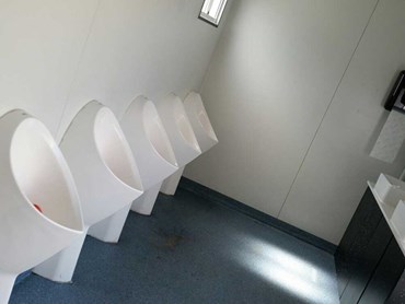 VIP bathroom featuring the Uridan Admiral waterless urinals
