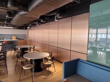 The visually stunning acoustic movable wall was installed between the bar and pantry areas