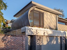 Uniquely designed shingles handcrafted in zinc for Centennial Park home