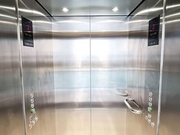 Commercial lift provides low headroom solution at Dee Why apartments