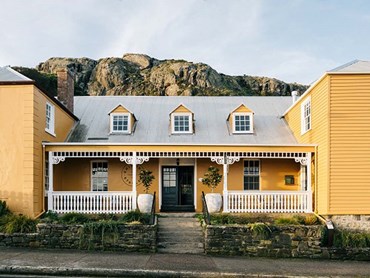 The Ship Inn: Mustard on the outside, paired with white-trimmed black doors