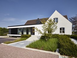 Renson cladding and sunscreens add modern touch to farm-style house