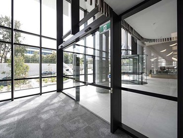Record's revolving door and swing door at Macquarie Corporate Centre