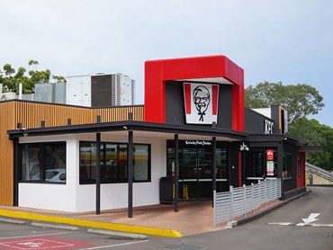 Bespoke perforated metal panels and signage on a KFC outlet