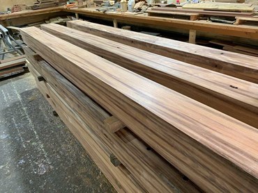 Planks from timber power poles