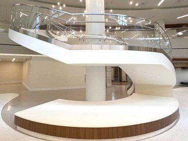 The finished bent glass installation for the hospital's circular staircase and railing