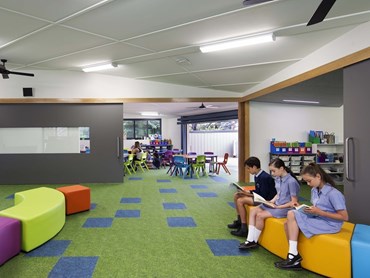 Through visual variation in floor finishes, Harrison &amp; White and Paul Coffey Architects aimed to integrate, yet differentiate internal and external spaces at St. Bernard&rsquo;s Primary School, Year 5&amp;6 Learning Hub, Victoria. Photography by Ben Hosking&nbsp;

