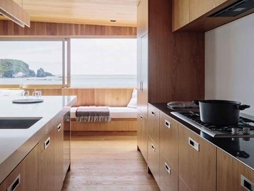 The 'social kitchen' maintains a seamless flow with integrated appliances