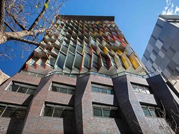 Patterned façade created with brick inlay on 14-storey Sydney building