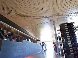 Custom perforated ceiling panels meet complex brief for iconic winery