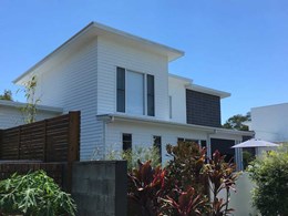 Weatherboard-style cladding meets brief for Noosaville townhouses