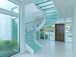 Circular glass staircase takes centre-stage at Miami waterfront house