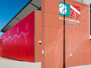 Blacktown tennis centre featuring Arrow Metal's red perforated metal mural