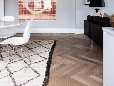 The Potts Point apartment featuring a herringbone pattern floor