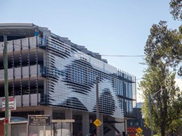 Twisted fin screening provides solar shading on Bourke Rd building