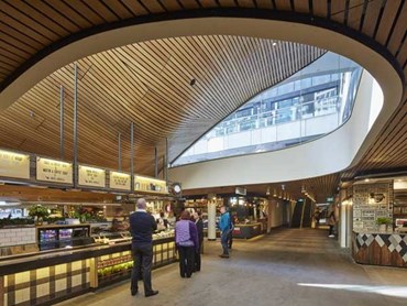 SUPASLAT slatted timber ceiling panels achieve an undulating curved effect on the ceiling throughout the Food Court