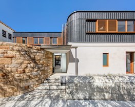 Beachside house that's a symphony of light, space & sandstone