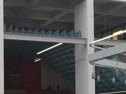 Custom drop ceiling acoustic solution makes a striking impact in university dining hall